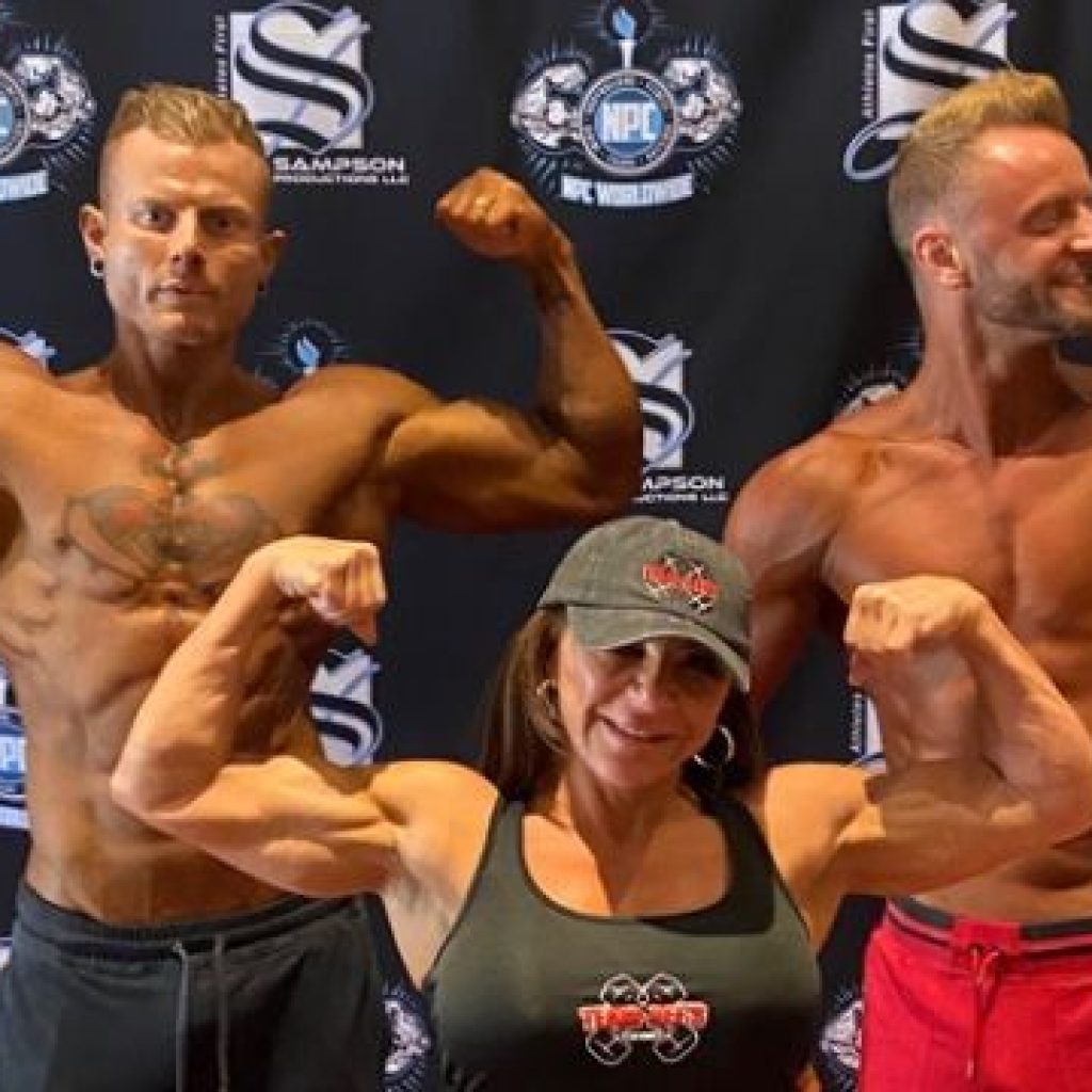 Dee Bloom and two competition participants that she trained.