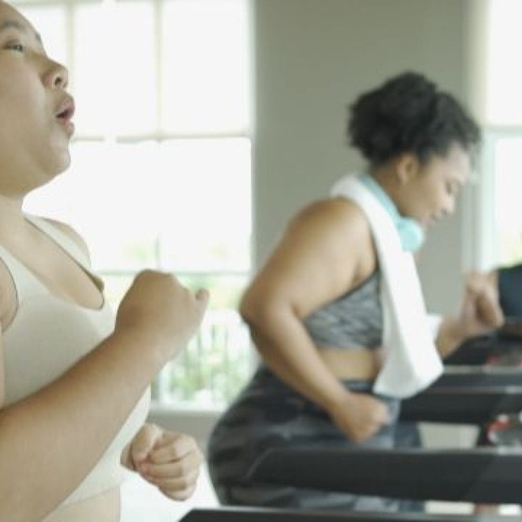 Women running on treadmills